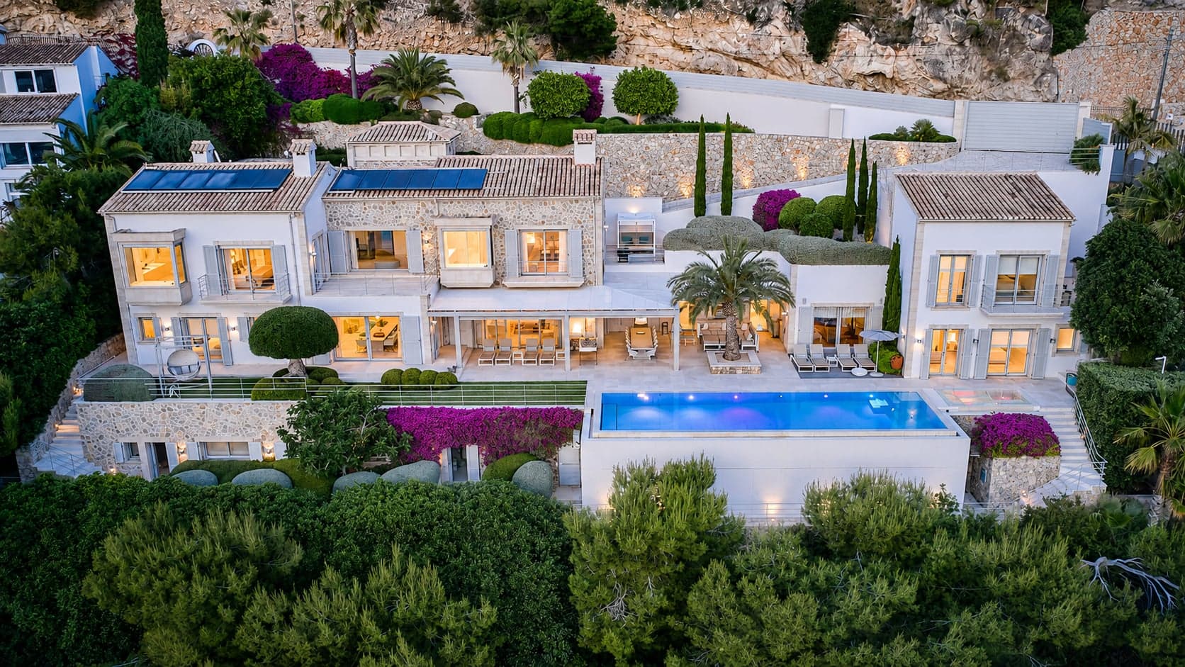 Aerial view of a villa with a pool and garden in Mallorca